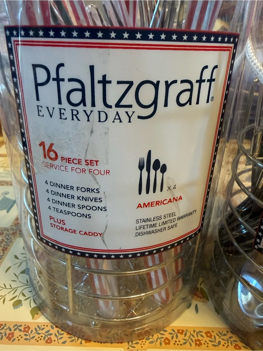 Two unopened packages of Pfaltzgraff Everyday Americana 16-piece flatware sets